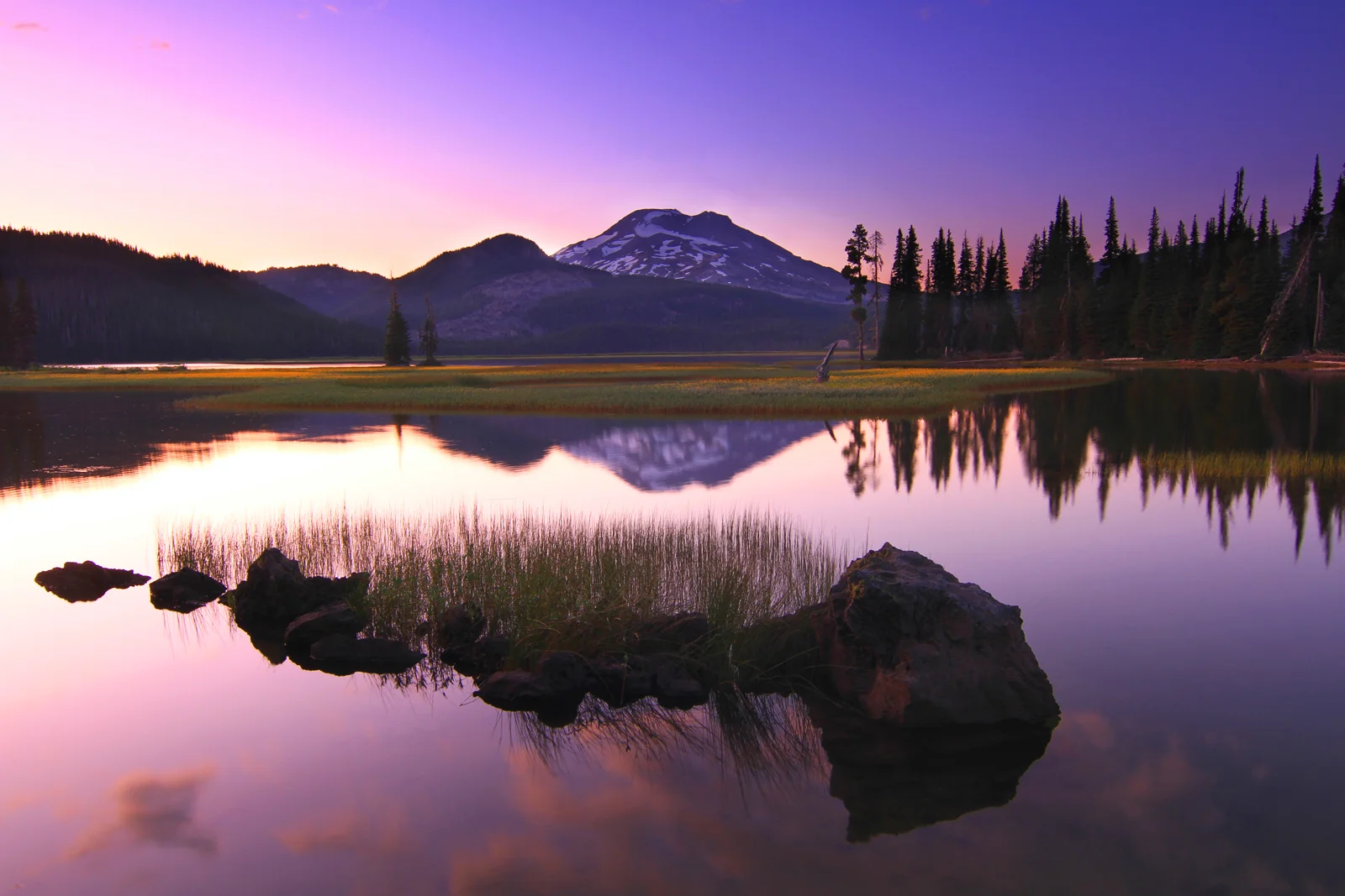 South Sister volcano reflected in Sparks Lake at dusk